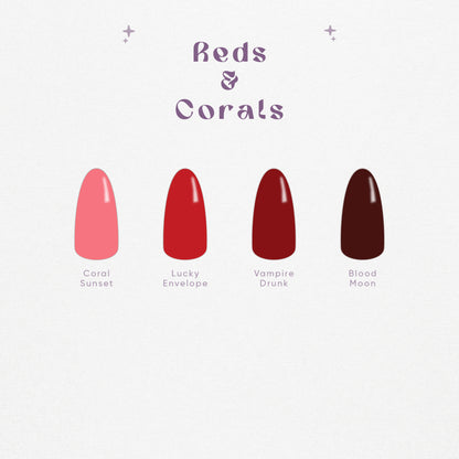 Red and coral solid color press-on nail swatches including bright red and deep burgundy shades.